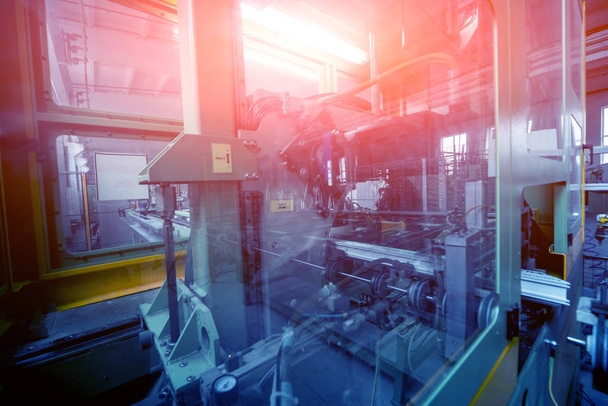 Завод по производству алюминиевых и ПВХ окон и дверей. Подробности industrial equipment. Фон
 - Фото, изображение