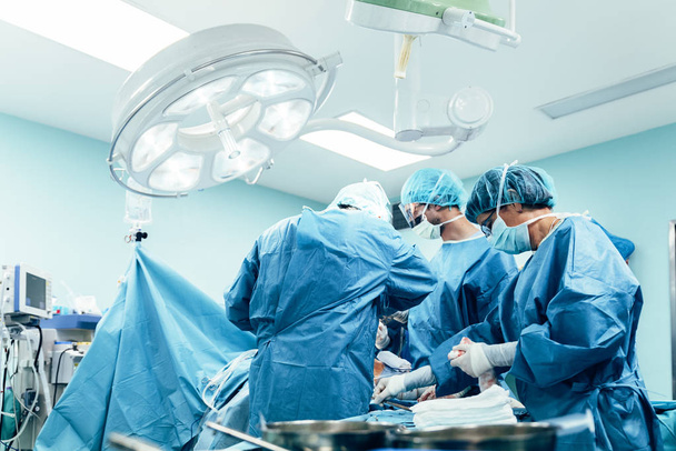 Team of Surgeons Operating in the Hospital - Photo, Image