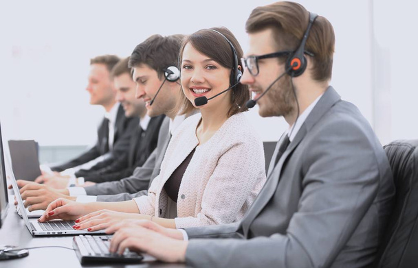 operator call center with colleagues sitting at the workplace - Photo, Image