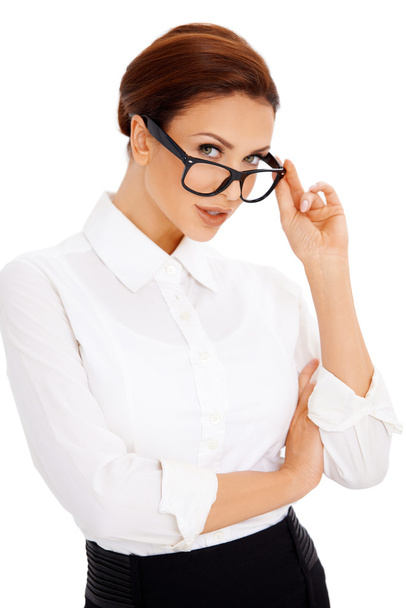 Mujer mirando por sus gafas
 - Foto, Imagen