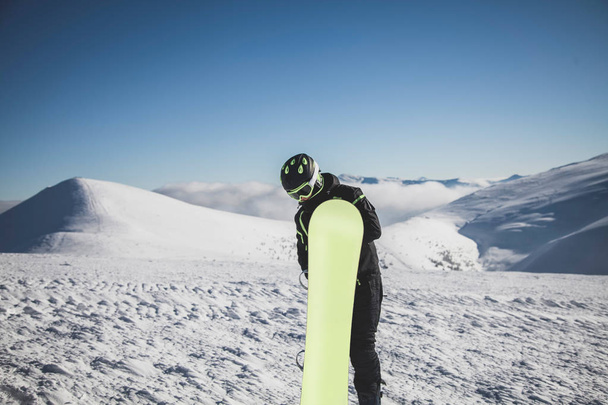 Snowboarder with  Board in Mountains - Φωτογραφία, εικόνα