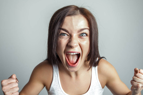 Woman screams in rage. Emotion concept - Photo, Image