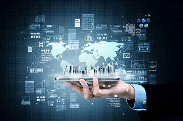 Internet verbinding concept met een zakenman hand met smartphone met futuristische gebouw en moderne technologie gerelateerde grafische pictogram - Foto, afbeelding