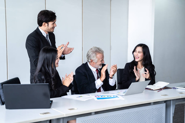 group of successful businessman. Discussion of the business profits of the company in meeting roon or conference room. - Photo, Image