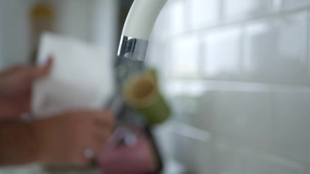 Man Hand Fill a Glass of Water on the Sink in Kitchen - Footage, Video