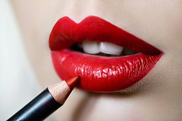 Makeup Lips. Beautiful Woman Lips With Lip Pen. - Foto, immagini