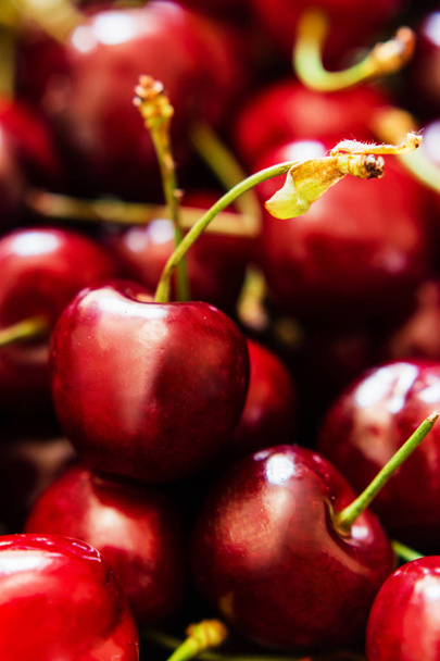 Ripe cherries. View from above. Cherry background, fresh cherries, sweet cherries.  - Фото, зображення