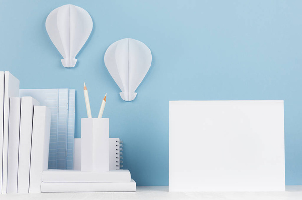School template -  white books, stationery, blank notebook and decorative ballons origami on white desk and soft blue background. Back to school background with copy space. - Φωτογραφία, εικόνα