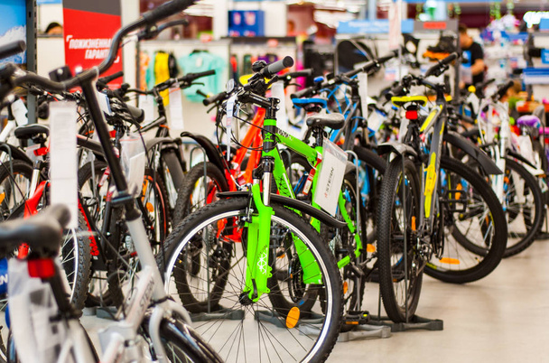 Minsk, Belarus - July 21, 2018: new modern bicycles selling in sports shop - Photo, image