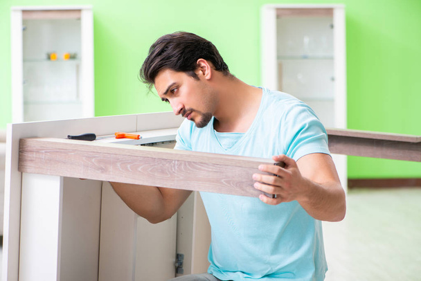 Man repairing furniture at home - Photo, Image