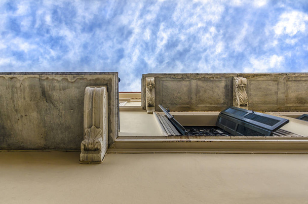 Plaka, Athens / Greece. Looking up into the sky below a house in Plaka, Athens.  - Photo, Image