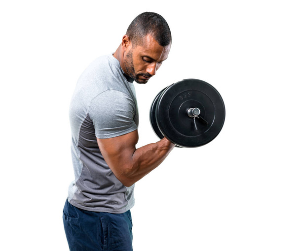 Strong handsome sport man making weightlifting on isolated white background - Photo, Image