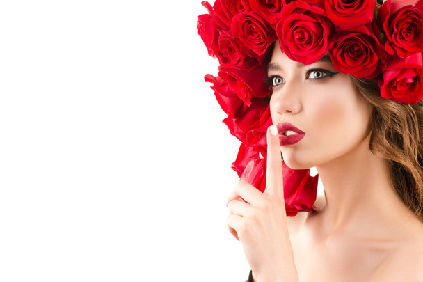 beautiful portrait young girl with hairstyle from red roses - Photo, Image