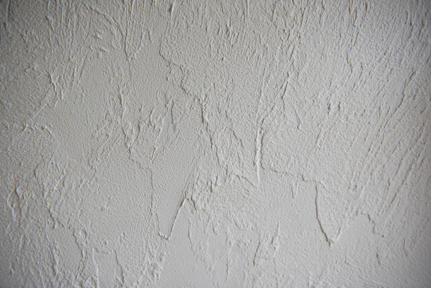 Grey plaster background, cracked and textured leaden cement - Photo, Image