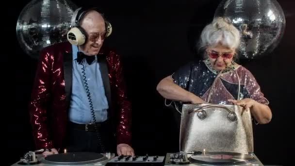 DJ grandma and grandpa, older couple partying in disco setting - Footage, Video