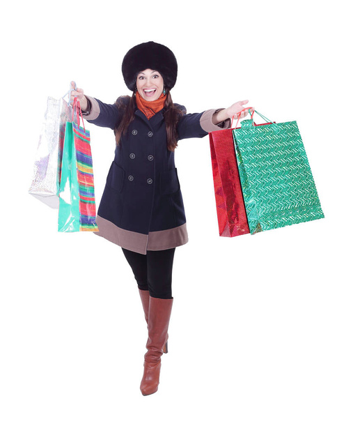 young woman in winter clothes with shopping bags - Valokuva, kuva