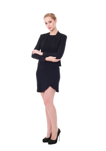 Full length portrait of an attractive professional woman wearing black dress.  isolated on a white background. - Zdjęcie, obraz