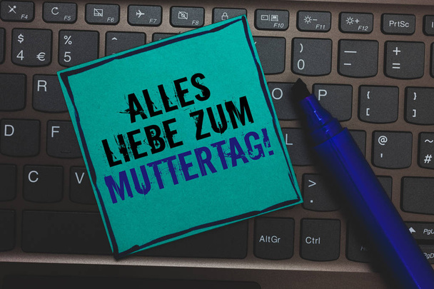 Text sign showing Alles Liebe Zum Muttertag. Conceptual photo Happy Mothers Day Love Good wishes Affection Huge button with computer keyboard black lined written blue page marker pen - Фото, зображення