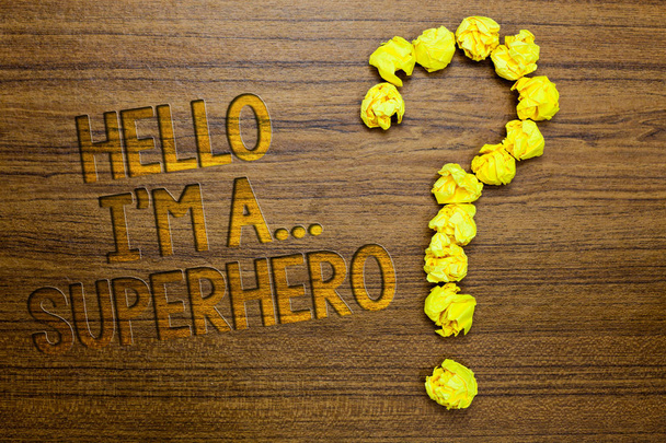 Word writing text Hello I am A ... Superhero. Business concept for Special powers Cartoon character Customs strenght Wooden floor with some letters yellow paper lumps formed question mark - Photo, Image