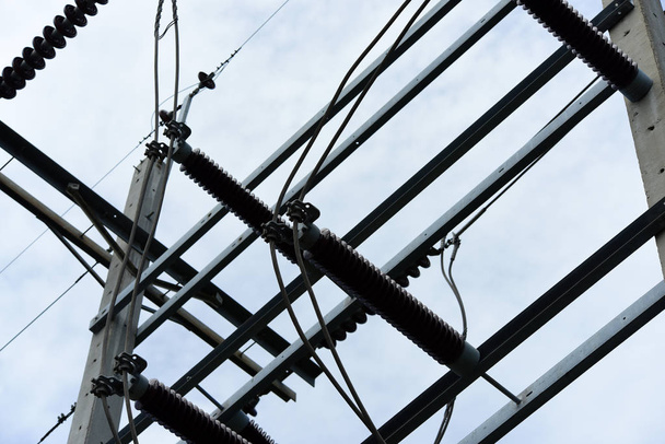 High voltage transmission line.high voltage pole Power transmission system With sky background image. High-voltage tower at blue sky background - Photo, Image