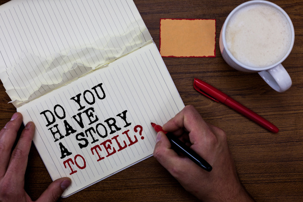 Handwriting text writing Do You Have A Story To Tell question. Concept meaning Storytelling Memories Tales Experiences Sticky note red pen coffee with coffee mug hand hold pen with written words - Photo, Image
