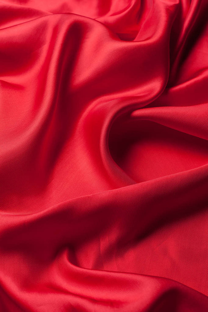 Red silk cloth waves background texture - Фото, изображение