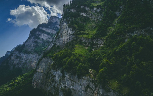 aerial view of steep mountain cliff in the swiss alps - Foto, Bild