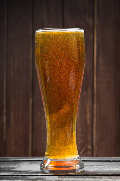 Beer drinking concept close up shot - Фото, изображение