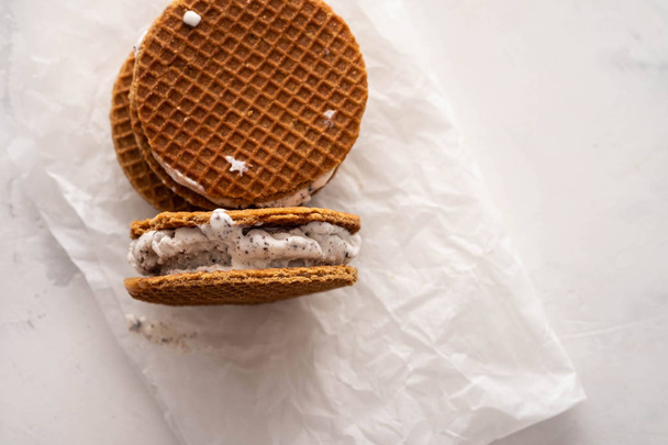 Stack of ice cream sandwiches with cookies isolated on a white background. Copy space. - Φωτογραφία, εικόνα
