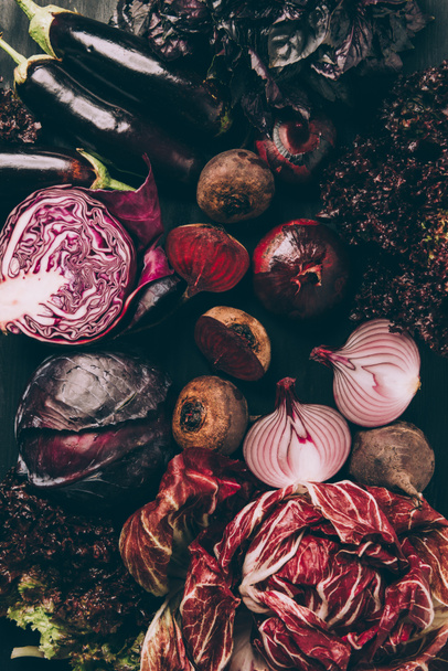 top view of different red vegetables on tabletop - Fotoğraf, Görsel
