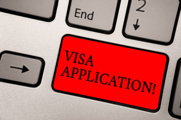 Conceptual hand writing showing Visa Application. Business photo text Form to ask permission travel or live in another country Greyish silver keyboard with red color button black color texts - Photo, Image