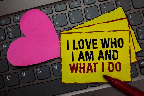 Writing note showing I Love Who I Am And What I Do. Business photo showcasing High self-stem being comfortable with your job Red bordered yellow written paper pinch with love on computer keybaord - Photo, Image