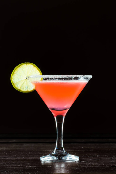 Red Cocktail over dark background  - Fotó, kép