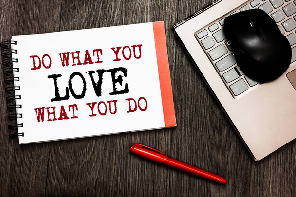 Conceptual hand writing showing Do What You Love What You Do. Business photo showcasing Make things that motivate yourself Passion Bluetooth mouse on keyboard words red pen on wooden deck - Photo, Image