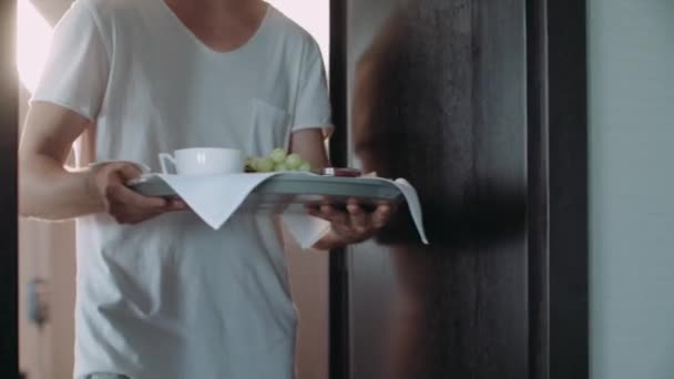Husband Brings His Young Wife Breakfast In Bed - Materiał filmowy, wideo