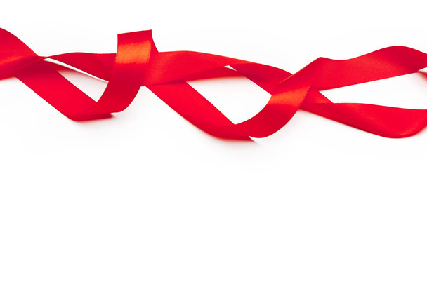 Red ribbon isolated on white background - Фото, зображення