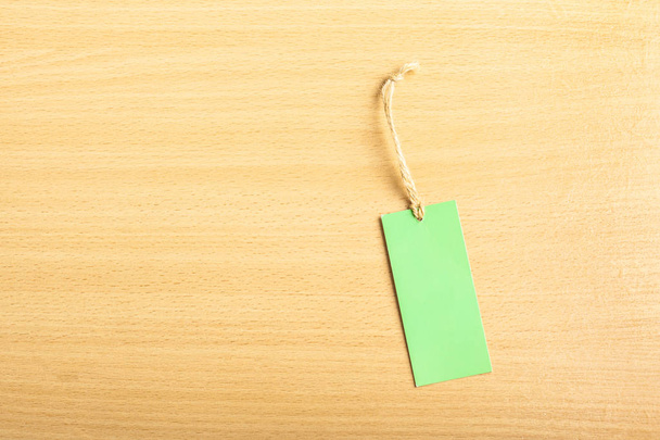 Blank tag on wooden background - Фото, зображення