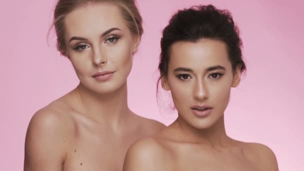 Beauty video concept with two young girls - Footage, Video