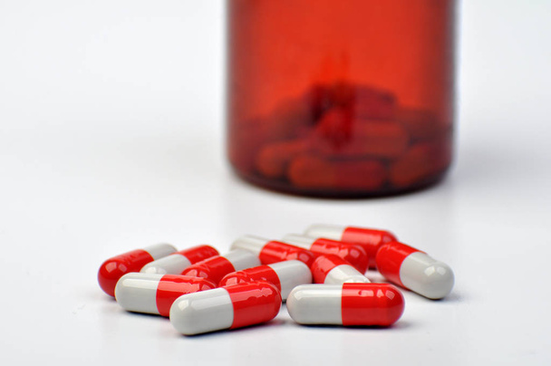Capsule Pill Drug Medicine and Bottle  White Background - Фото, зображення