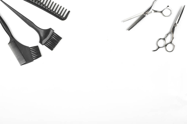 Professional hairdresser tools on white background with copy space - Фото, зображення
