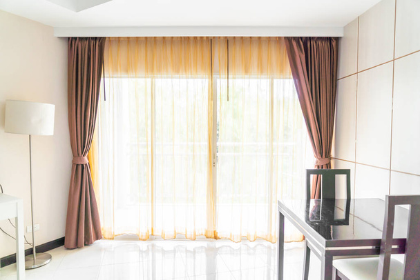 Curtain interior decoration in living room with sunlight - Fotó, kép