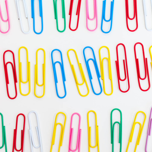 Metal paper clips isolated on a white background - Photo, Image