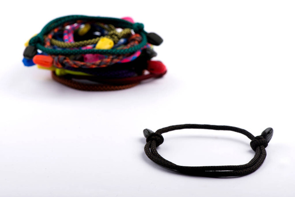 bracelets with threads. Braided bracelets. bracelet on the arm - Фото, зображення