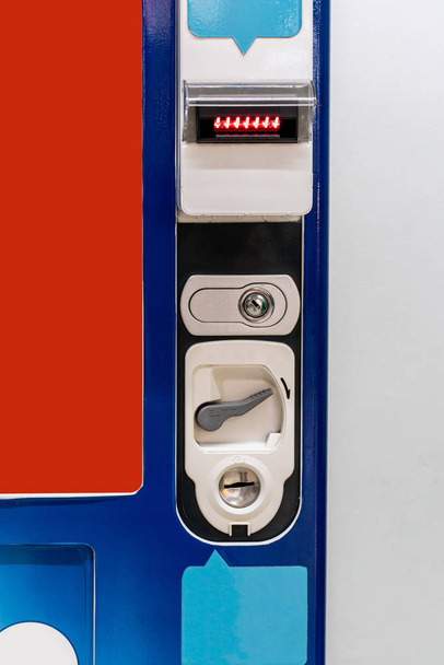 Close-up to the vending machine purchase system interface against white wall - Photo, Image
