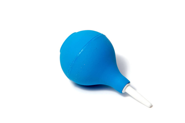blue enema ot syringe bulb. Isolated on white  - Photo, image