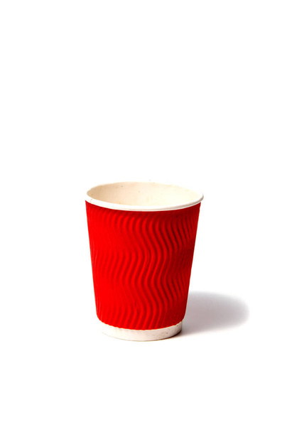 Red paper disposable cup. Isolated on a white background - Photo, Image