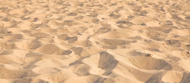 Closeup of sand pattern of a beach in the summer. Background.concept for summer season. - Foto, immagini