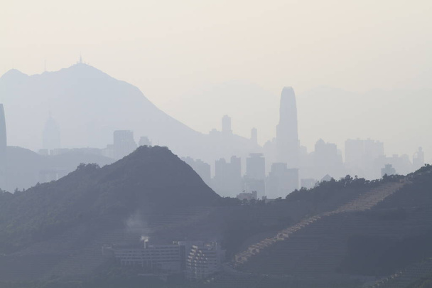a Hong Kong elhomályosítja a levegőszennyezés, amint a klm - Fotó, kép