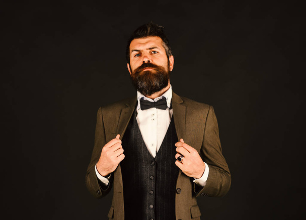 Director or entrepreneur with stylish beard and moustache.. Entrepreneurship and business concept. Businessman with proud face - Фото, зображення