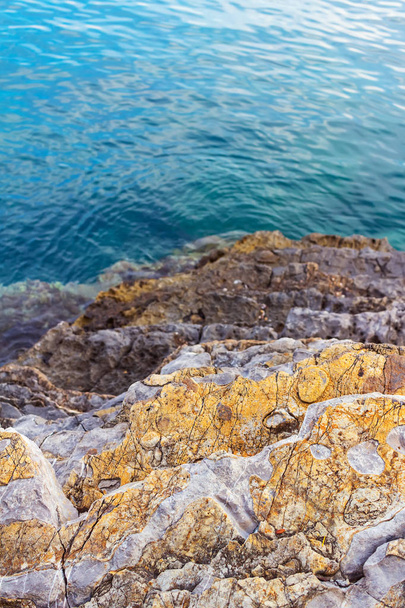 View from a high rock to the turquoise water in Adriatic sea at Montenegro. - Photo, Image